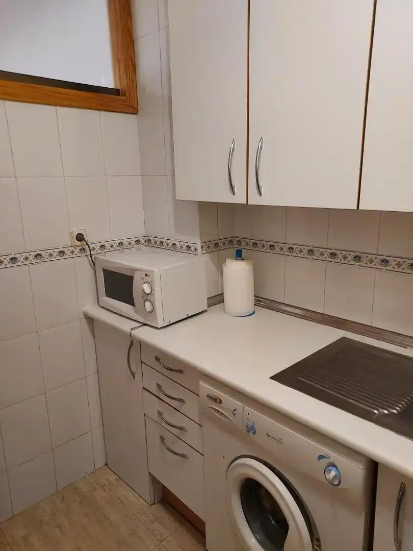 Cuina de Apartament de lloguer en Orihuela amb Aire condicionat, Piscina i Balcó