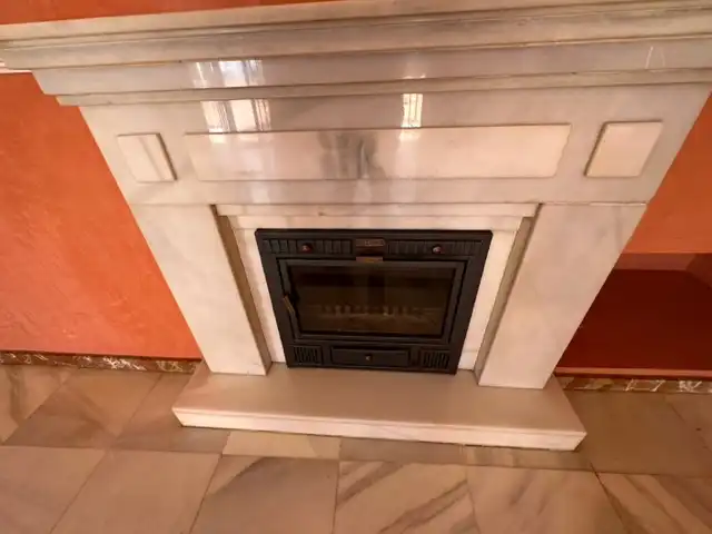 Sala de estar de Casa adosada en venta en Huelva con Aire acondicionado, Calefacción y Jardín privado