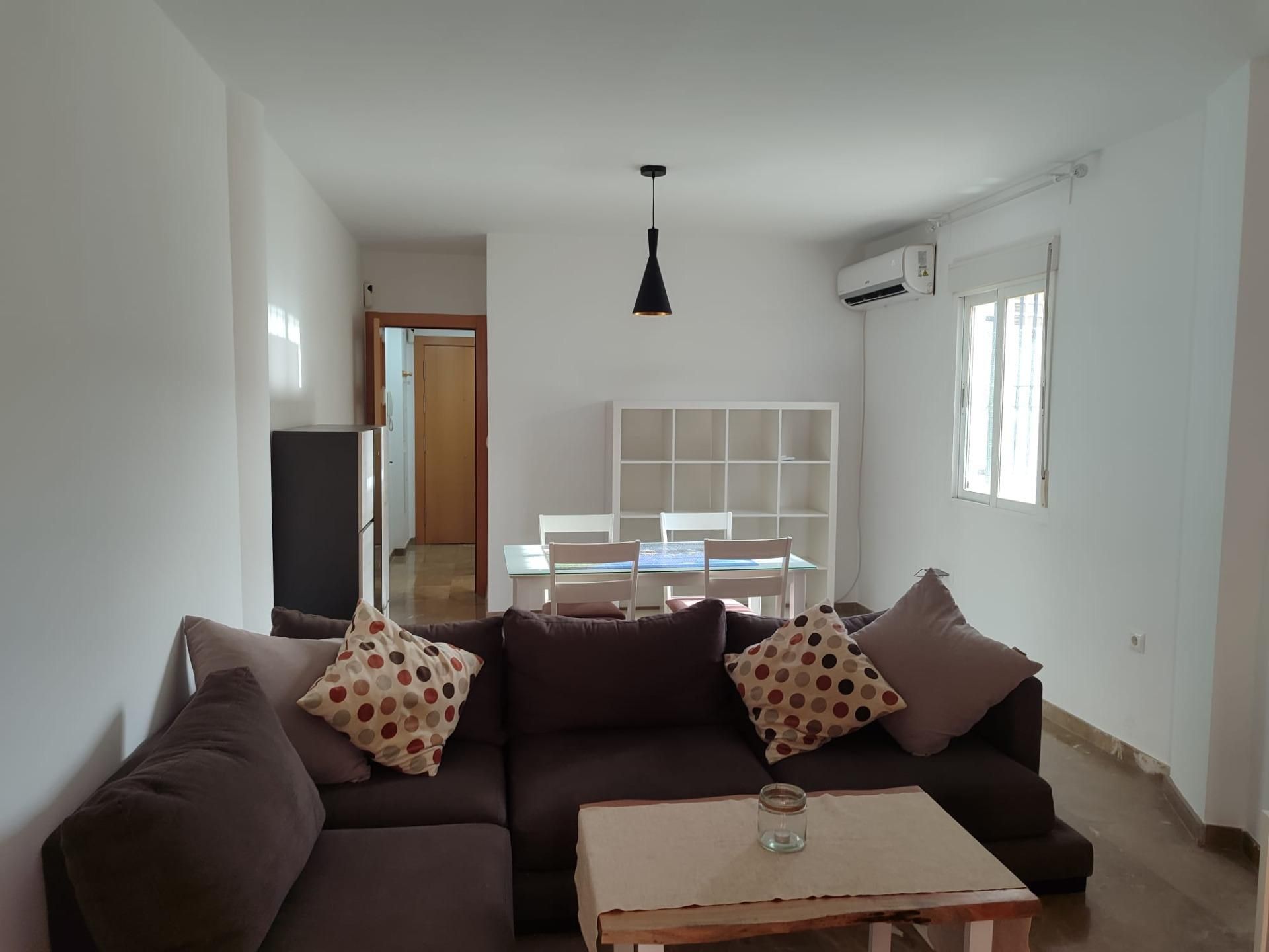 Sala d'estar de Pis de lloguer en La Malahá amb Aire condicionat i Terrassa