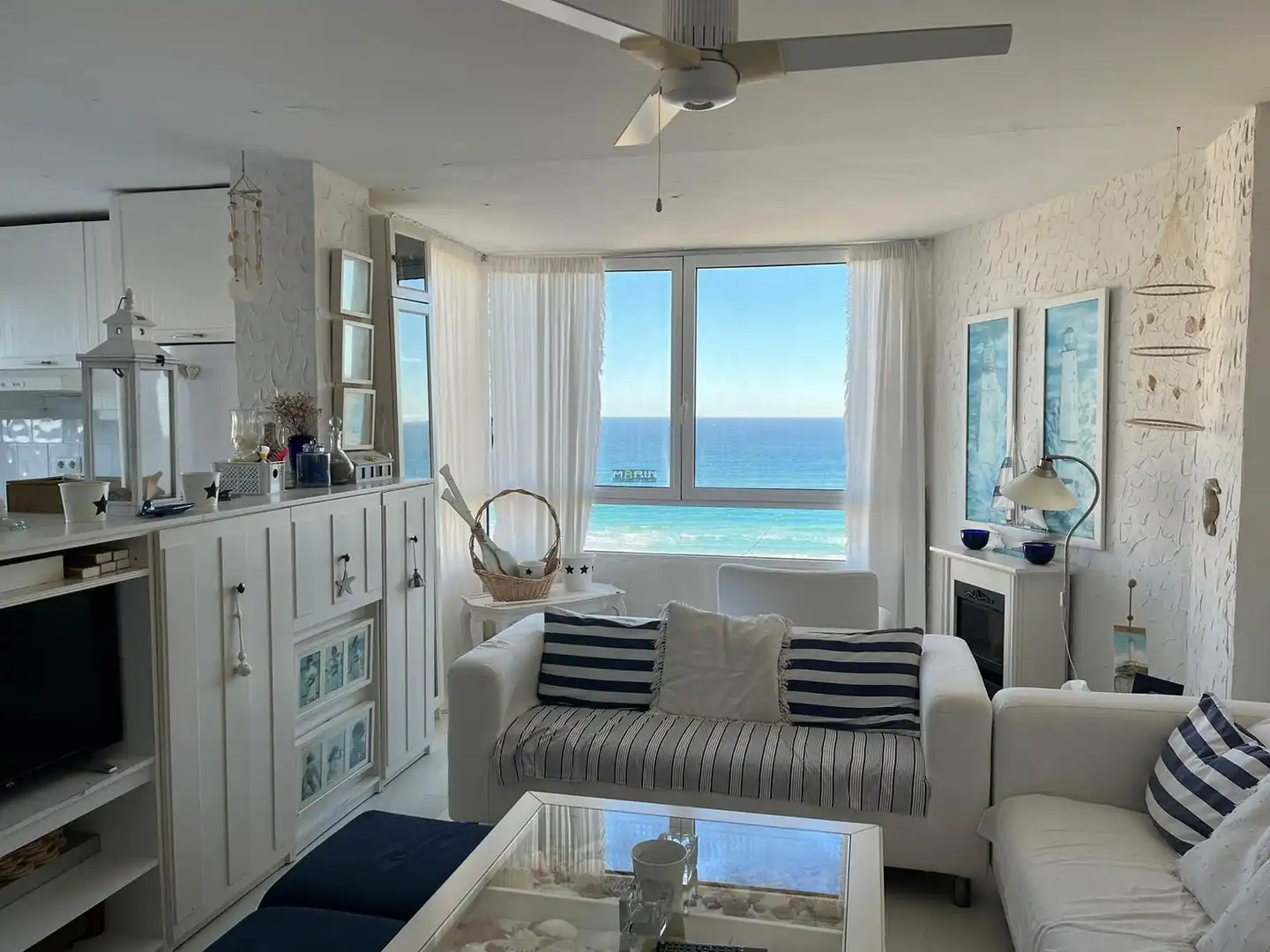 Sala de estar de Ático en venta en La Manga del Mar Menor con Aire acondicionado, Terraza y Piscina comunitaria