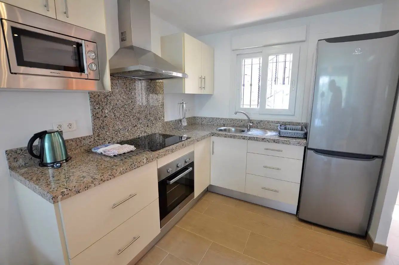 Cocina de Casa adosada de alquiler en Almuñécar con Aire acondicionado, Calefacción y Terraza