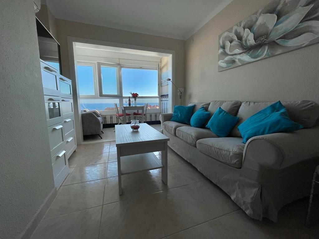 Sala d'estar de Apartament de lloguer en Torrox amb Aire condicionat, Moblat i Piscina comunitària