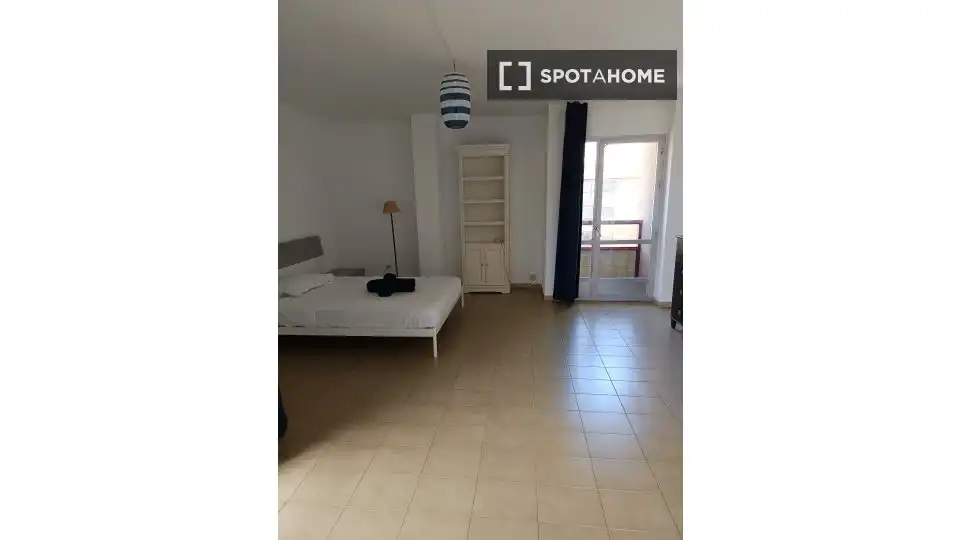 Bedroom of Flat for share in Almería  with Air Conditioner, Heating and Furnished