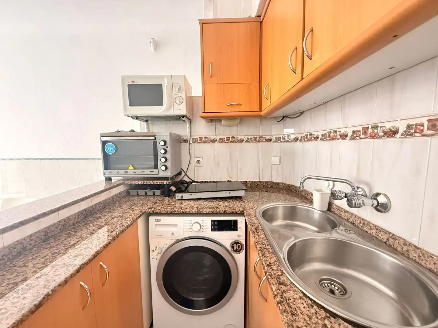 Cuina de Casa adosada en venda en Empuriabrava amb Aire condicionat, Calefacció i Moblat