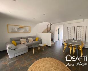 Living room of Single-family semi-detached for sale in L'Escala  with Air Conditioner, Terrace and Community pool