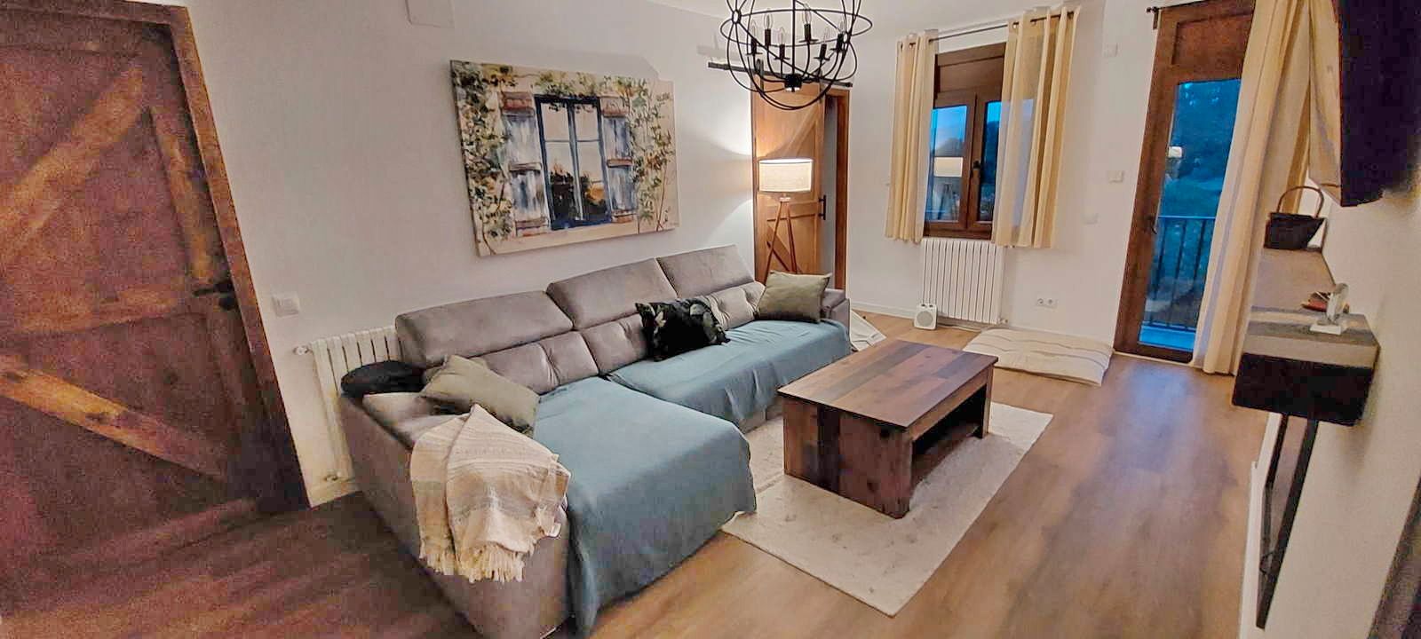 Sala d'estar de Apartament en venda en Molló amb Parquet i Moblat