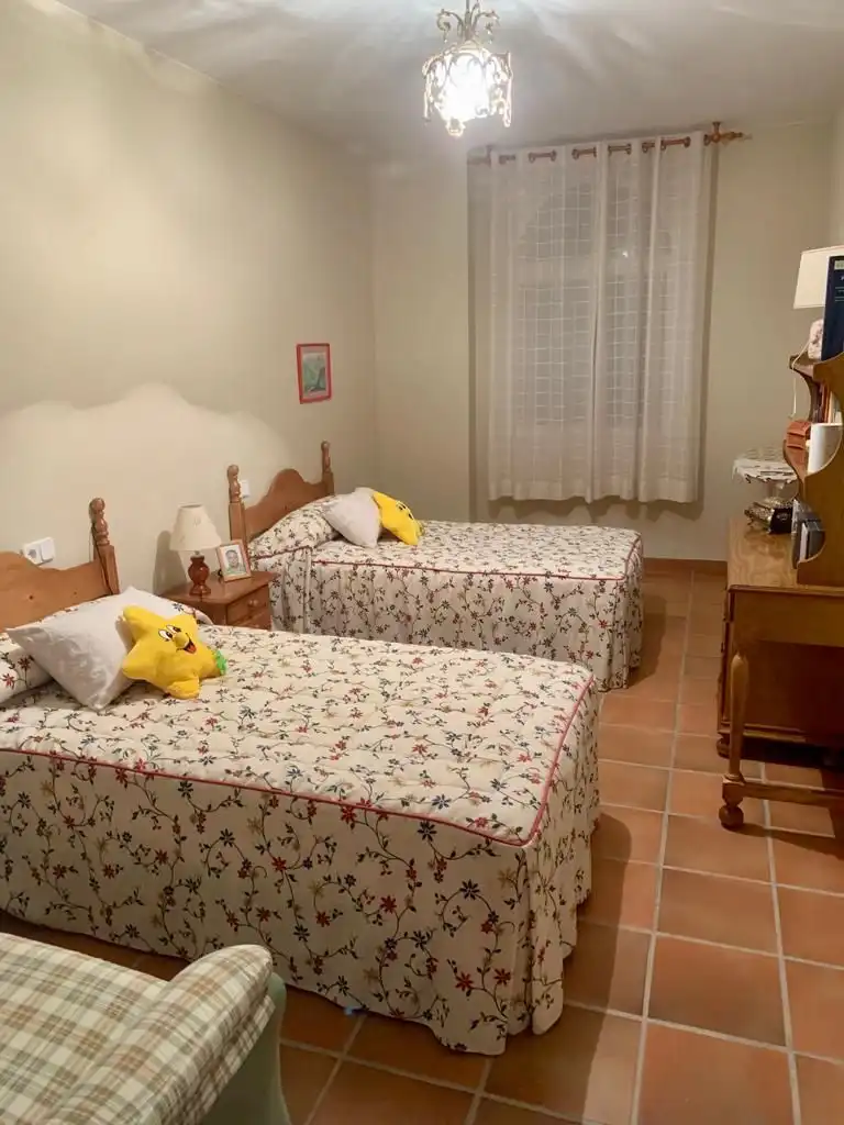Habitación de Casa o chalet en venta en Úbeda con Jardín privado, Piscina y Balcón