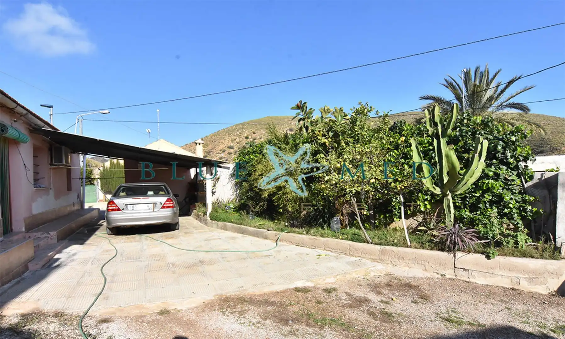 Vista exterior de Casa o xalet en venda en Mazarrón amb Aire condicionat, Calefacció i Jardí privat