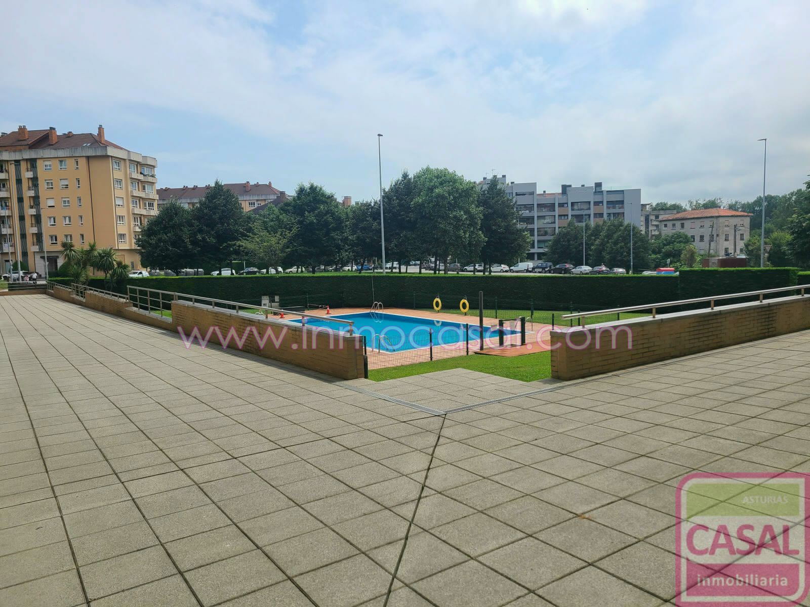 Swimming pool of Flat for sale in Gijón   with Heating and Storage room