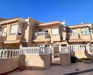 Vista exterior de Casa adosada en venda en Santa Pola amb Terrassa, Balcó i Piscina comunitària