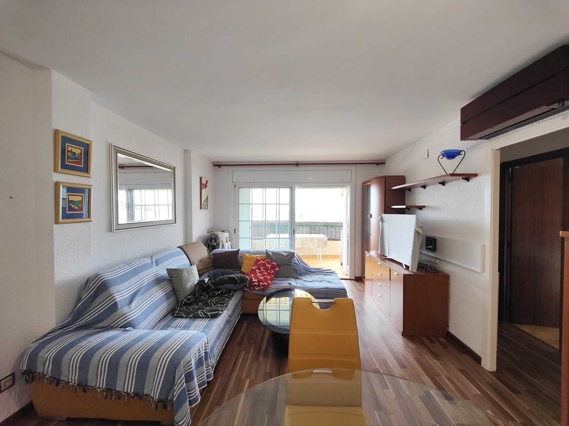 Wohnzimmer von Wohnung zum Verkauf in Cunit mit Klimaanlage und Terrasse