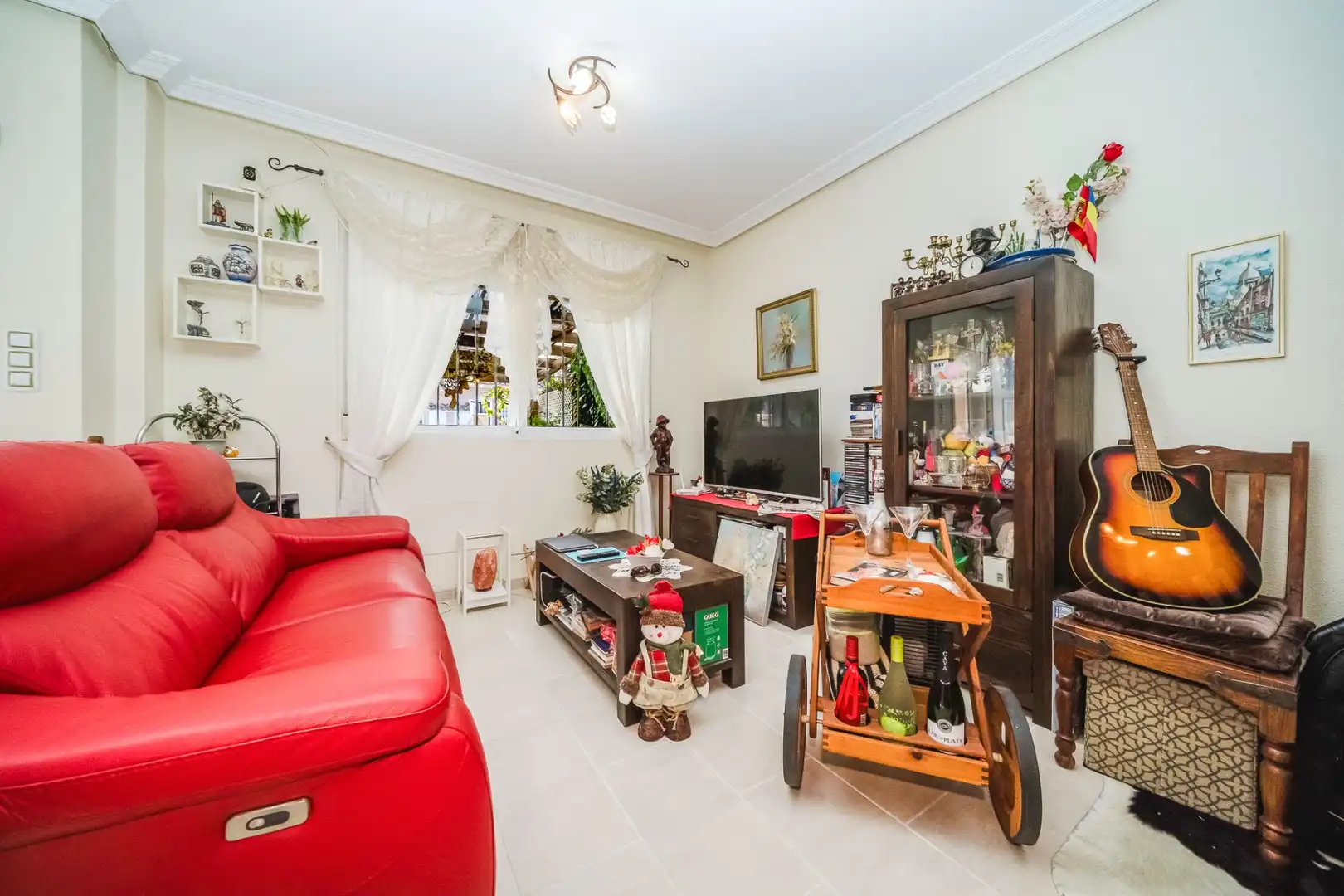 Sala d'estar de Casa adosada en venda en Orihuela amb Aire condicionat, Terrassa i Traster