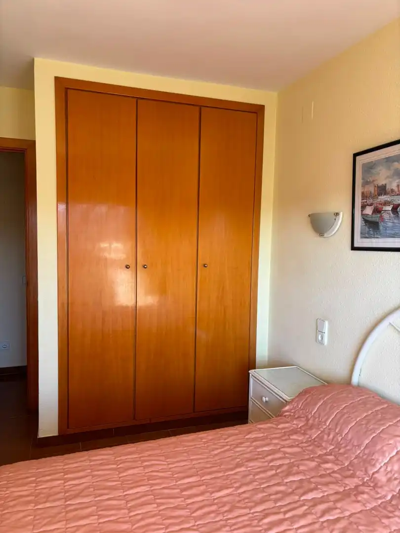 Habitación de Apartamento en venta en Salou con Aire acondicionado, Amueblado y Piscina comunitaria