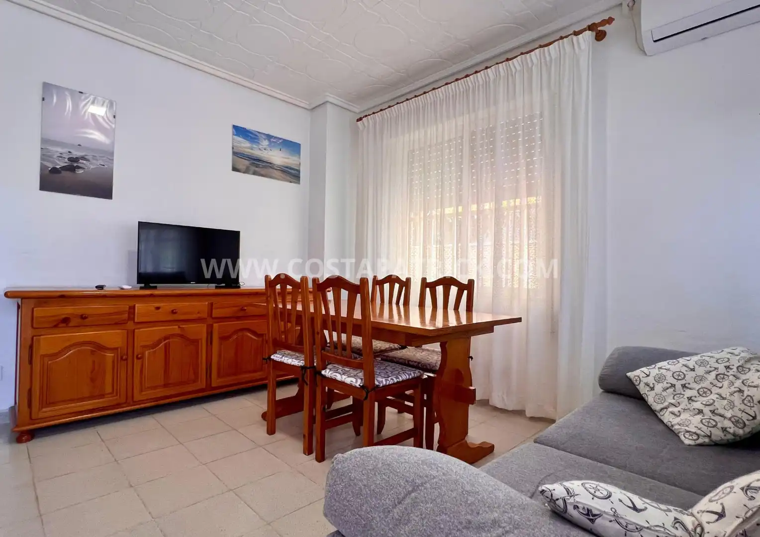 Sala de estar de Casa adosada de alquiler en Los Alcázares con Aire acondicionado, Jardín privado y Terraza