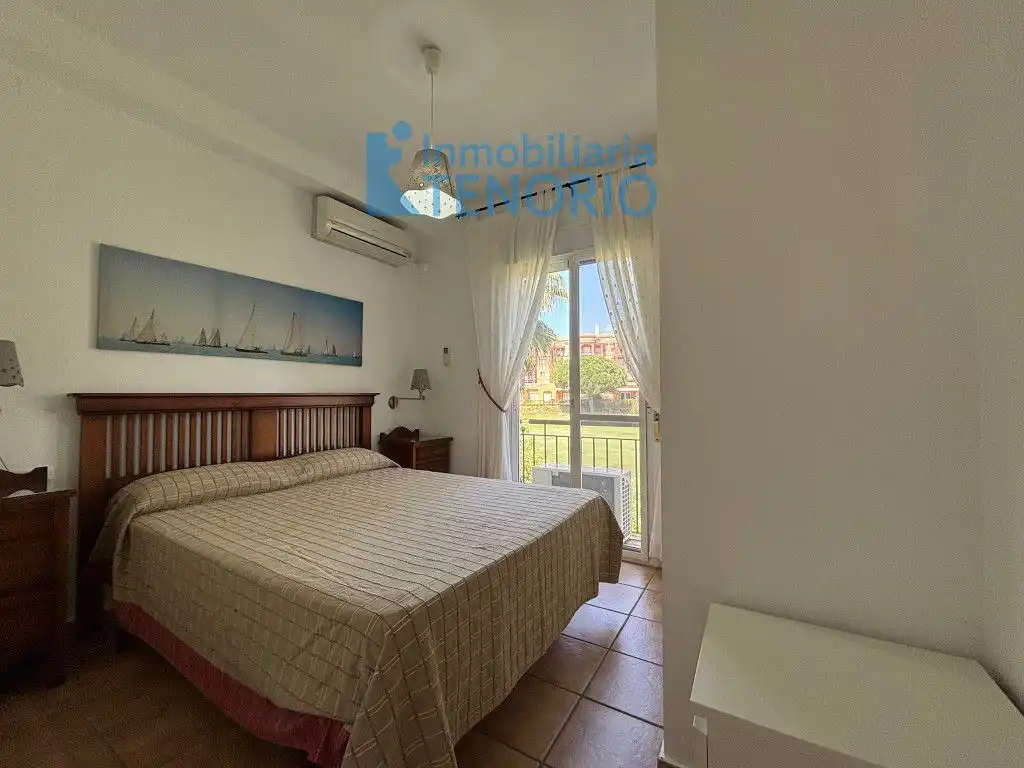 Habitación de Casa adosada en venta en Islantilla con Aire acondicionado, Terraza y Trastero