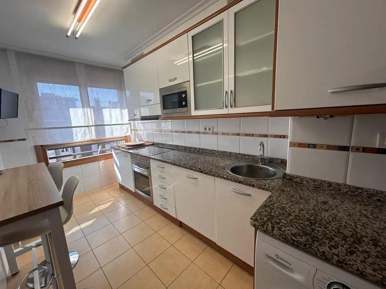 Kitchen of Flat for rent in Gijón   with Heating, Terrace and Storage room