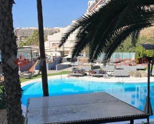 Piscina de Apartament de lloguer en Mogán amb Aire condicionat