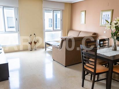 Living room of Flat for sale in Garrucha  with Air Conditioner, Furnished and Oven