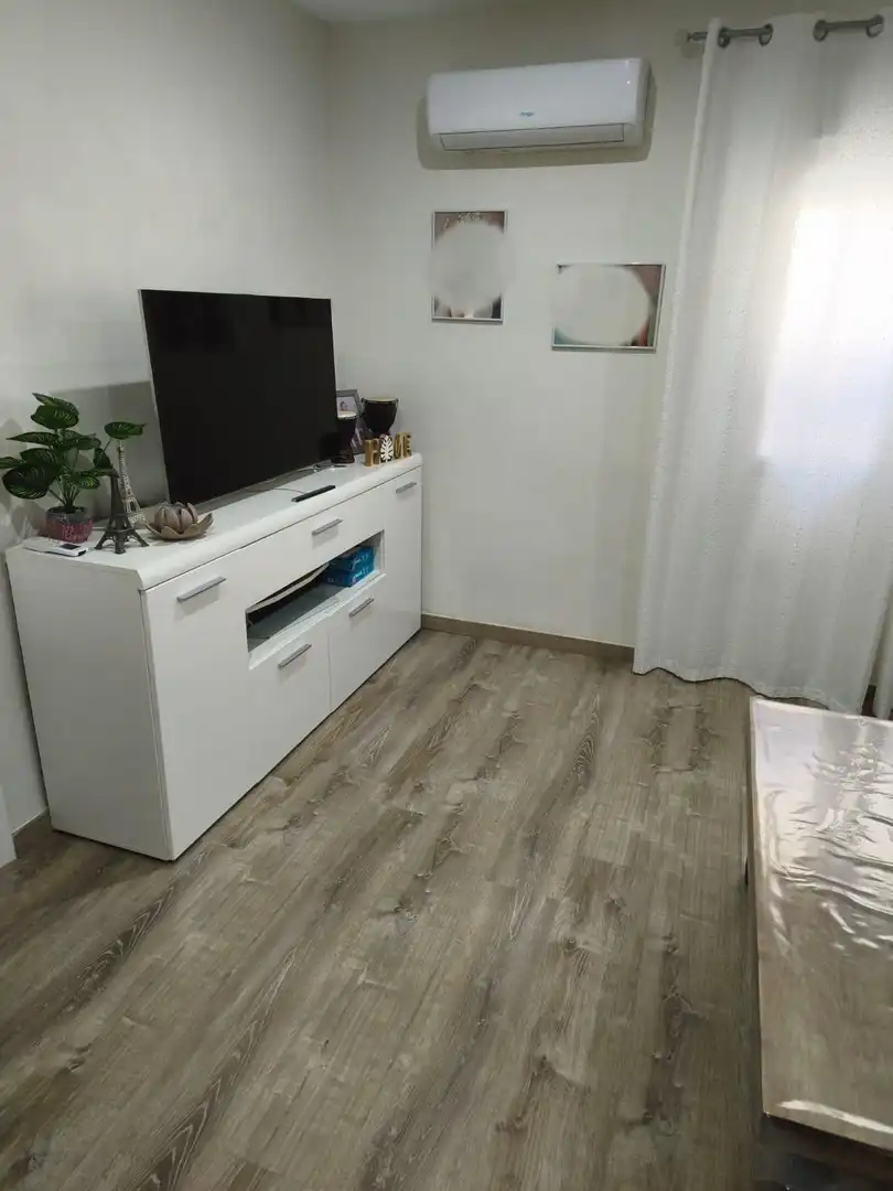 Sala d'estar de Planta baixa en venda en Málaga amb Aire condicionat i Terrassa