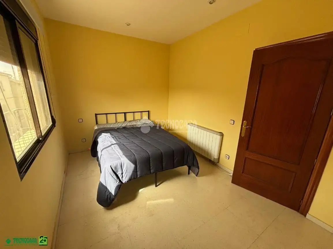 Dormitori de Casa adosada en venda en Granátula de Calatrava amb Aire condicionat