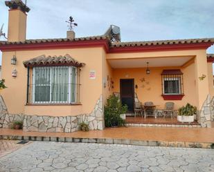 Exterior view of House or chalet for sale in Chiclana de la Frontera  with Air Conditioner, Heating and Private garden