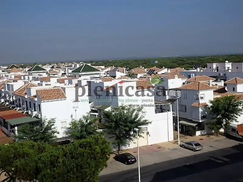 Vista exterior de Casa adosada en venta en Punta Umbría con Aire acondicionado, Calefacción y Jardín privado