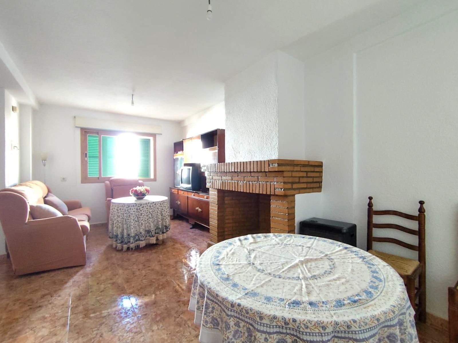 Sala d'estar de Casa adosada en venda en Moraleda de Zafayona amb Balcó