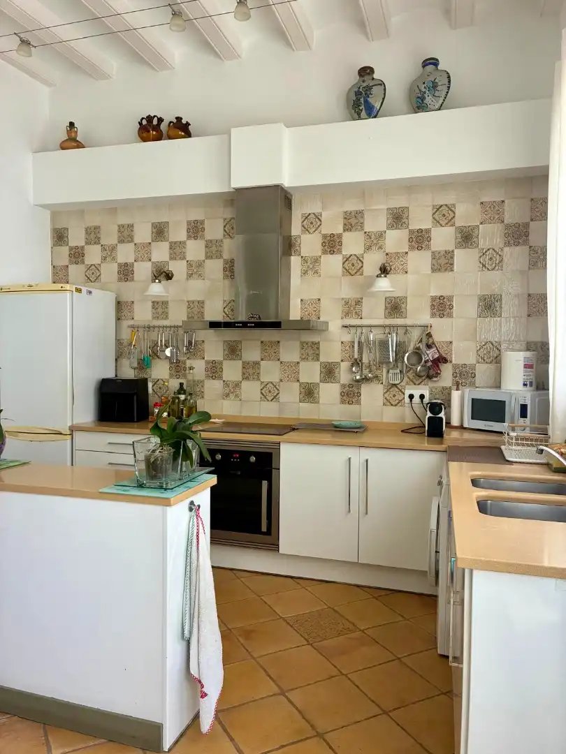 Cuina de Casa adosada en venda en Canet de Mar amb Aire condicionat, Terrassa i Forn