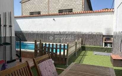 Swimming pool of Single-family semi-detached for sale in La Rinconada  with Air Conditioner, Parquet flooring and Terrace