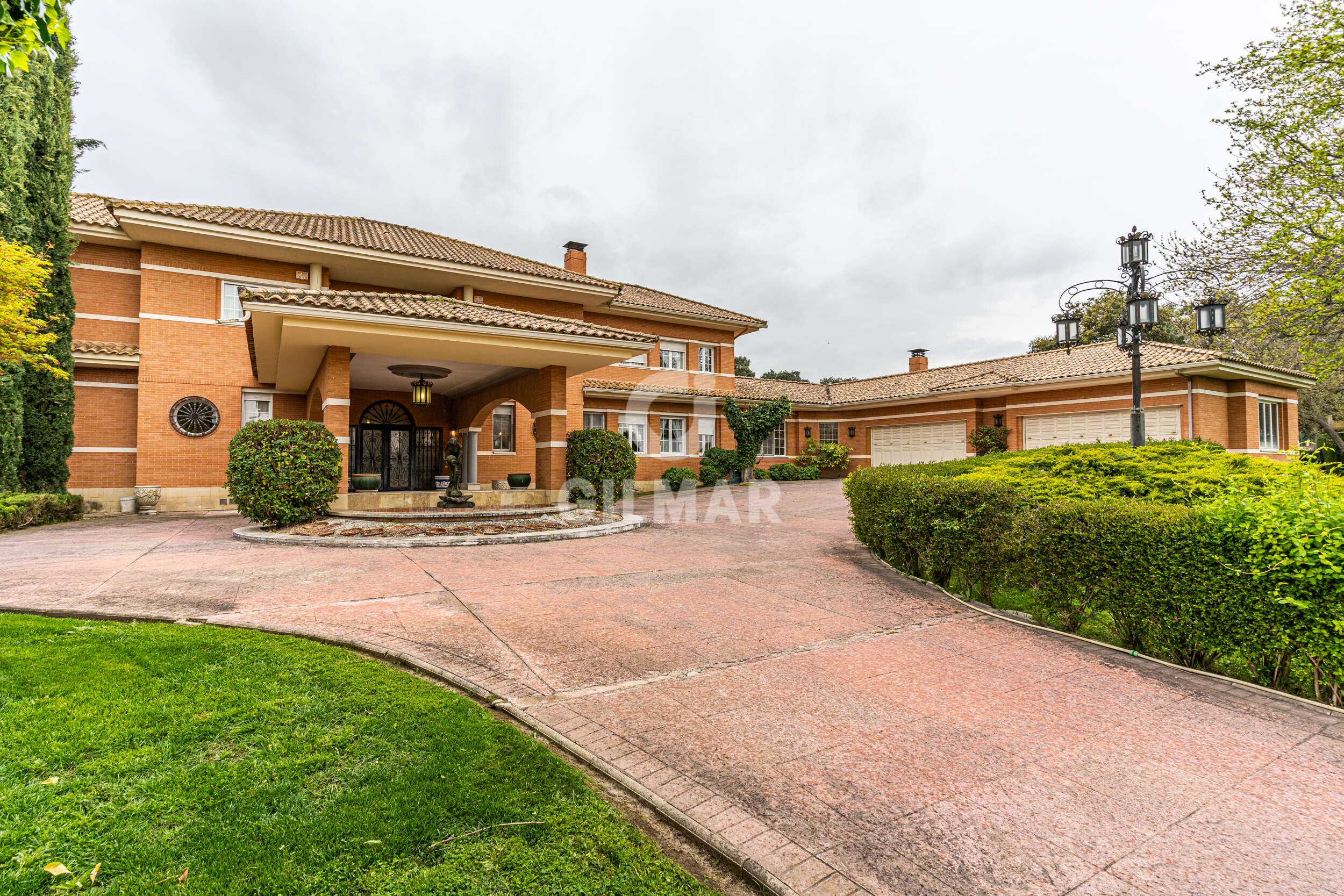 Exterior view of House or chalet for sale in Villanueva de la Cañada  with Heating, Private garden and Swimming Pool