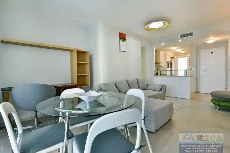 Sala de estar de Apartamento en venta en Torrevieja con Aire acondicionado, Terraza y Piscina