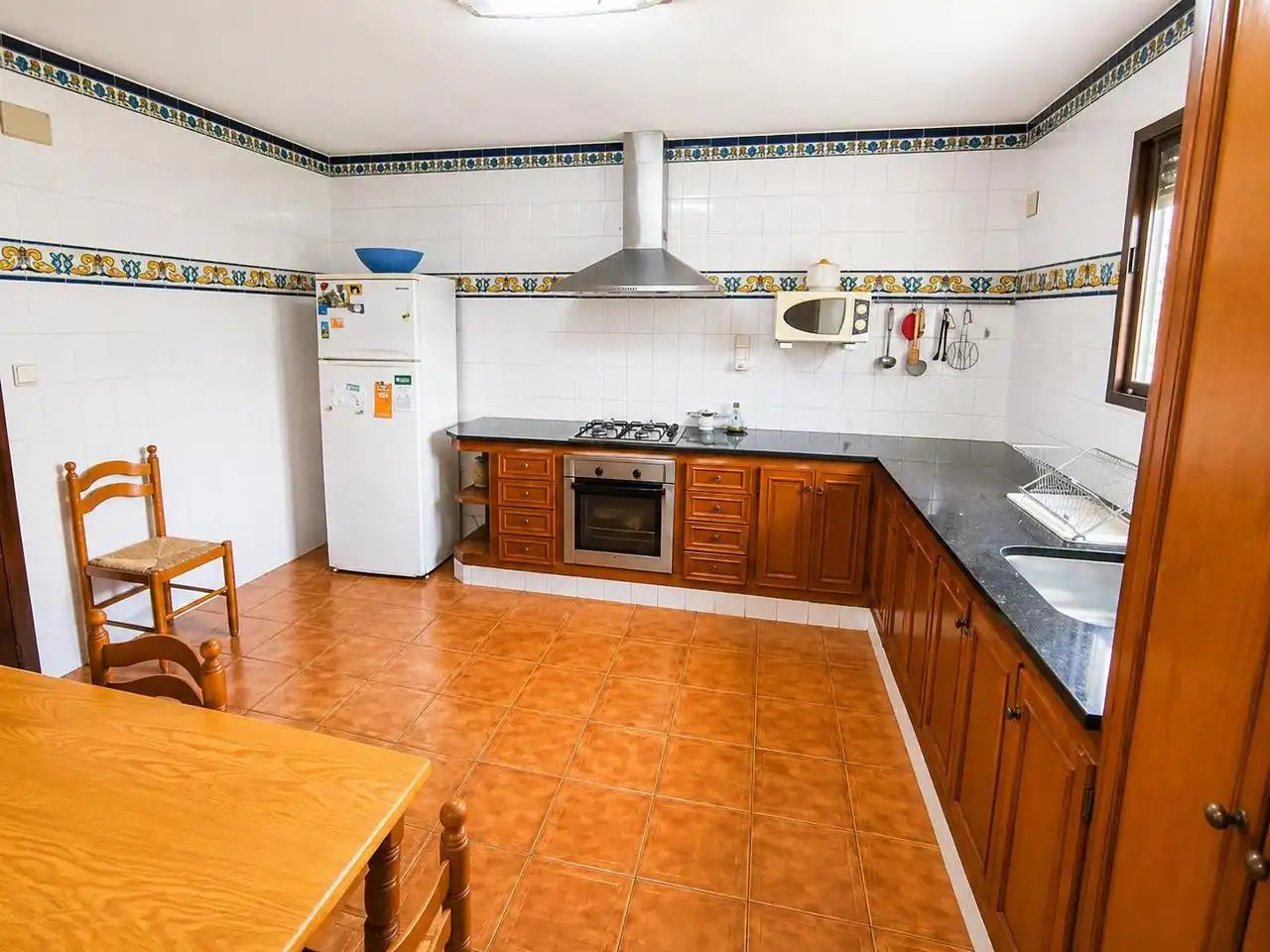 Cuina de Casa o xalet en venda en Oliva amb Jardí privat, Terrassa i Traster
