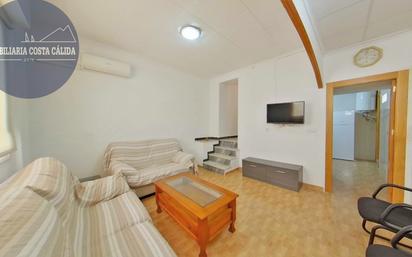 Sala d'estar de Casa adosada en venda en Águilas amb Aire condicionat, Terrassa i Balcó