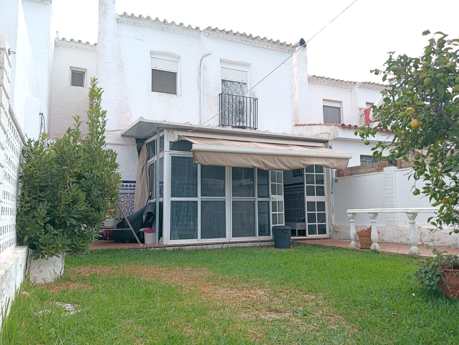 Jardín de Casa adosada en venta en Chiclana de la Frontera con Aire acondicionado, Jardín privado y Terraza