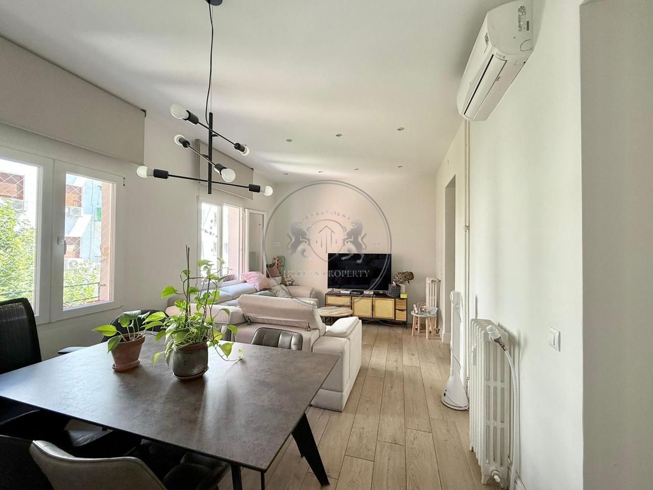 Sala de estar de Piso en venta en  Madrid Capital con Aire acondicionado y Calefacción