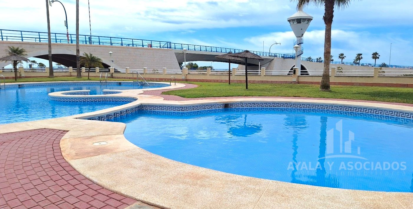 Swimming pool of Flat for sale in La Manga del Mar Menor  with Air Conditioner, Heating and Terrace