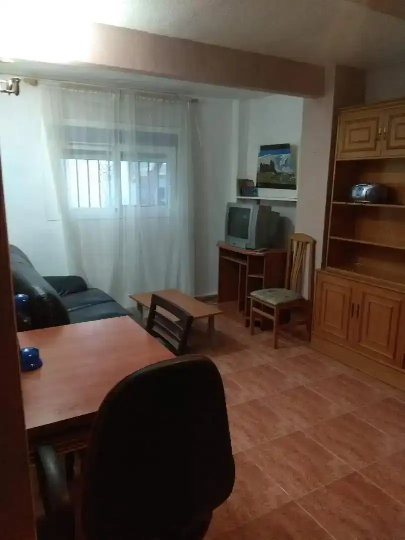 Sala d'estar de Casa adosada en venda en  Granada Capital amb Aire condicionat, Piscina i Balcó