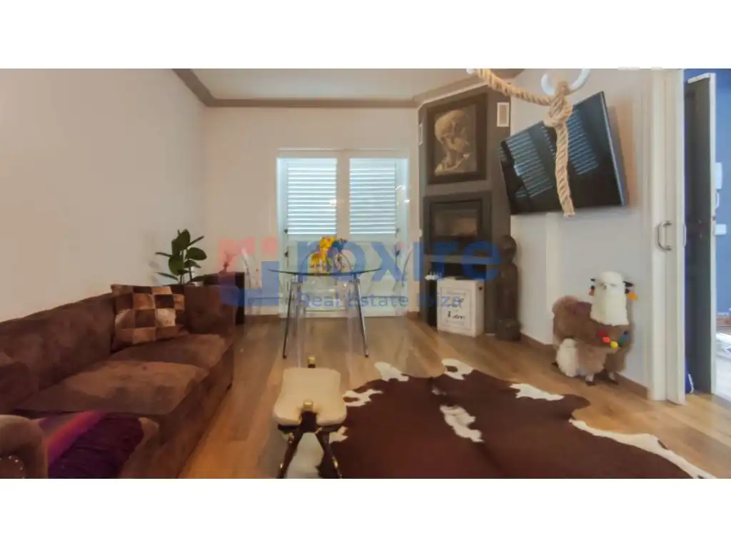 Sala d'estar de Planta baixa en venda en Sant Josep de sa Talaia amb Aire condicionat, Jardí privat i Terrassa