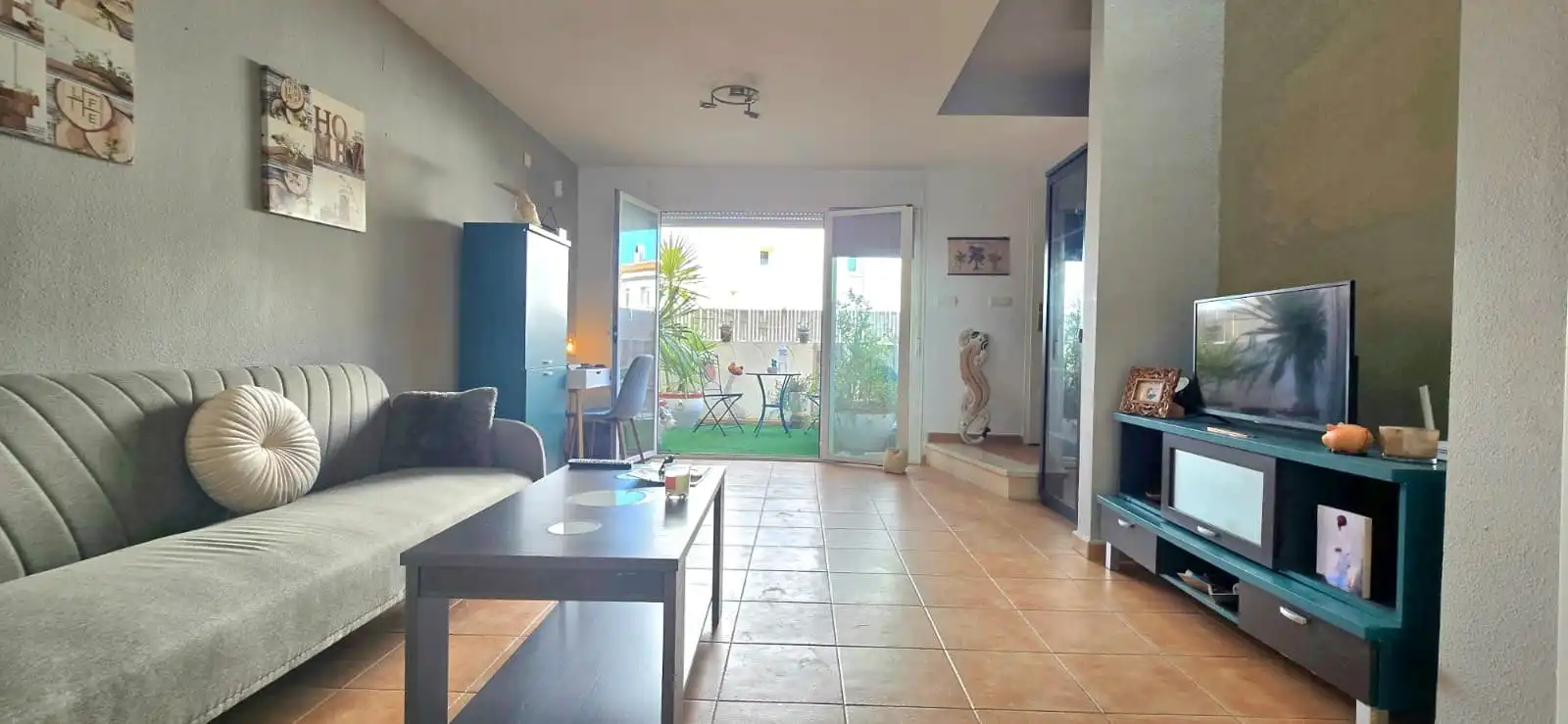 Sala d'estar de Casa adosada en venda en La Nucia amb Terrassa, Traster i Moblat