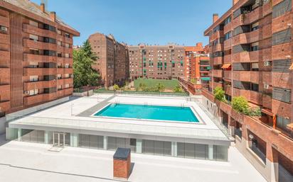 Swimming pool of Flat for sale in Tres Cantos  with Air Conditioner, Heating and Terrace