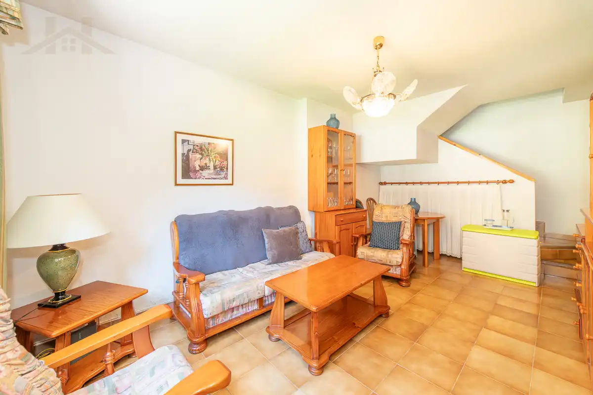 Sala de estar de Dúplex en venta en Manzanares El Real con Calefacción, Amueblado y Piscina comunitaria