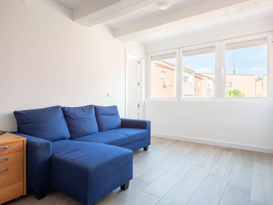 Sala de estar de Piso en venta en  Madrid Capital