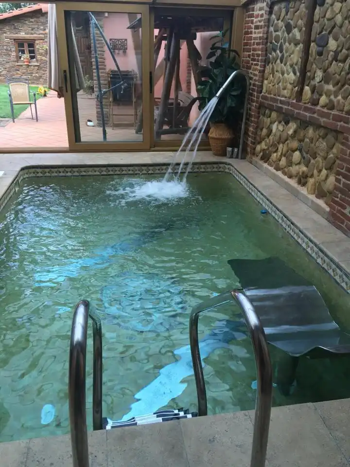 Piscina de Casa adosada en venda en San Andrés del Rabanedo amb Aire condicionat, Calefacció i Jardí privat