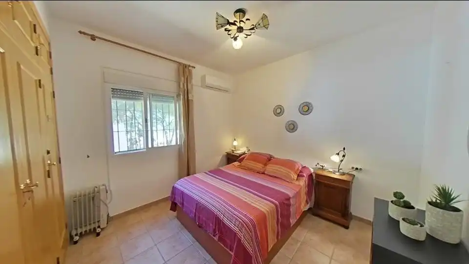 Schlafzimmer von Country house zum Verkauf in Isla Cristina mit Klimaanlage, Heizung und Privatgarten
