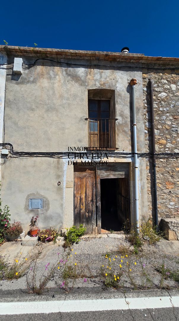 Casa adosada en venda