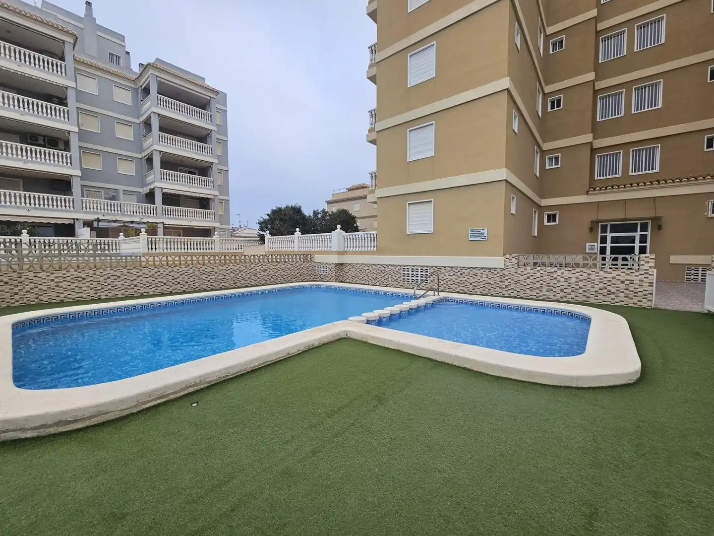Swimming pool of Flat for sale in Sueca  with Air Conditioner, Heating and Storage room