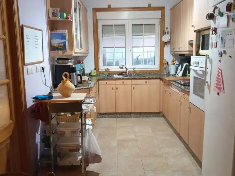 Cuina de Casa o xalet en venda en Culleredo amb Calefacció, Jardí privat i Terrassa