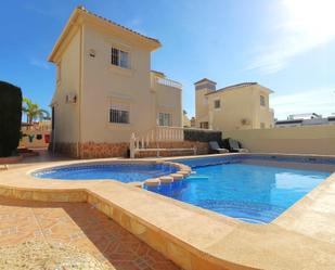 Swimming pool of House or chalet for sale in Orihuela  with Air Conditioner, Heating and Private garden