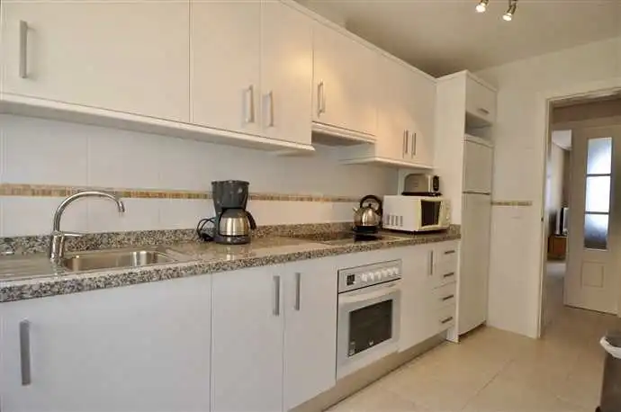 Cuina de Apartament en venda en Calpe / Calp amb Aire condicionat, Calefacció i Jardí privat