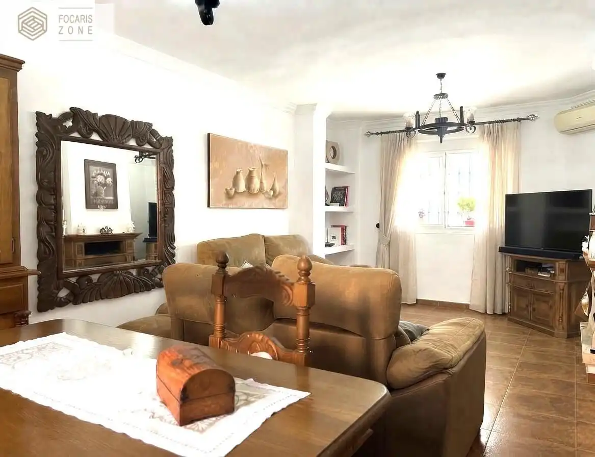 Sala d'estar de Casa adosada en venda en Málaga amb Aire condicionat, Calefacció i Terrassa
